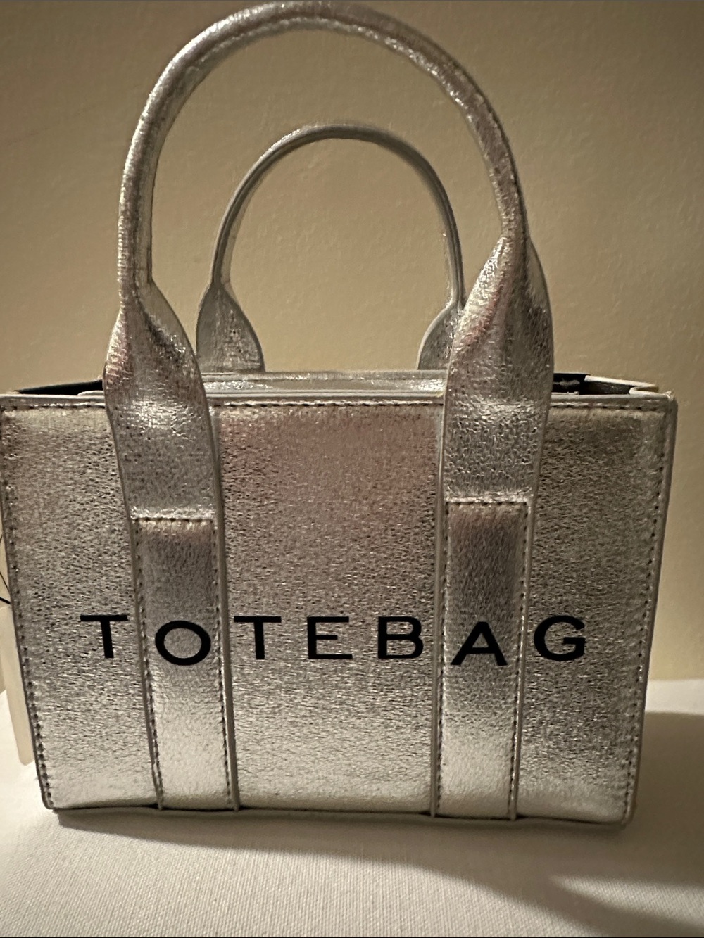 Metallic Silver Mini Tote Bag with 'TOTEBAG' Logo